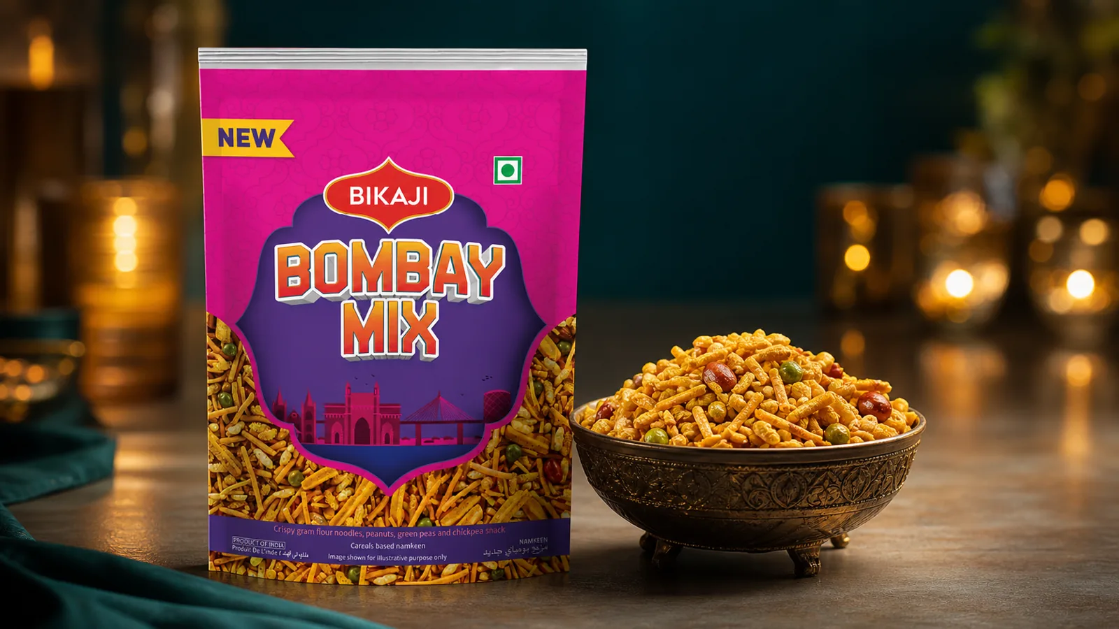 Air fryer basket of golden samosas beside a pack of Everest chaat masala